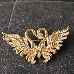 Nolan Miller gold and faux diamond pin